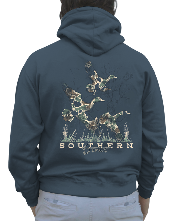 Duck Camo Trio Hoodie in Airforce Blue, back print of three camo mallards flushing from marsh grass