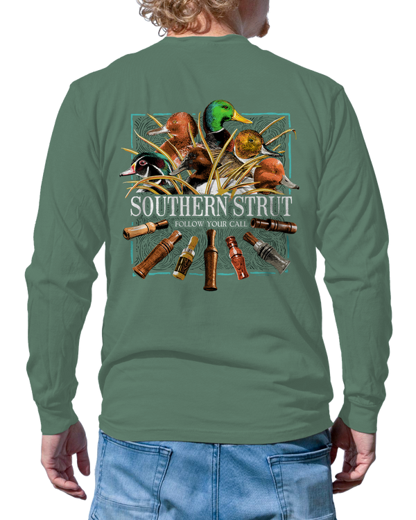 Follow Your Call Long Sleeve in Light Green, back print of Southern ducks in marsh grass over a spread of wooden duck calls